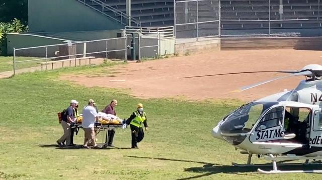 Author Salman Rushdie being transported to a helicopter after he was stabbed on stage before his scheduled speech at the Chautauqua Institution, Chautauqua, New York, US on August 12, 2022, in this screengrab taken from a social media video. (TWITTER @HoratioGates3 /via REUTERS) Author Salman Rushdie being transported to a helicopter after he was stabbed on stage before his scheduled speech at the Chautauqua Institution, Chautauqua, New York, US on August 12, 2022, in this screengrab taken from a social media video. (TWITTER @HoratioGates3 /via REUTERS)
