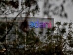 The logo of the Adani Group is seen on the facade of its Corporate House on the outskirts of Ahmedabad.