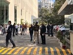A police officer (C) stands at the entrance of the office building where Indian tax authorities raided BBC's office in New Delhi on February 14, 2023. A police officer (C) stands at the entrance of the office building where Indian tax authorities raided BBC's office in New Delhi on February 14, 2023.