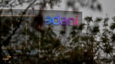 The logo of the Adani Group is seen on the facade of its Corporate House on the outskirts of Ahmedabad. (REUTERS)