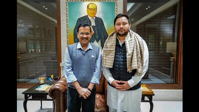 Bihar deputy chief minister Tejashwi Prasad Yadav meets Delhi chief minister Arvind Kejriwal in New Delhi on Tuesday. (PTI)