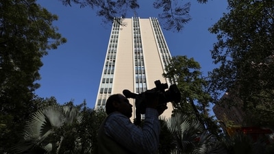 A cameraman works outside a building having BBC offices, where income tax officials are conducting a search, in New Delhi, India, February 14, 2023. REUTERS/Anushree Fadnavis (REUTERS)