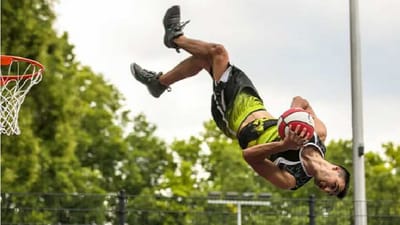 Longest barani flip bounce-pass relay for a forward flip slam dunk. (Website/@GuinnessWorldRecords)
