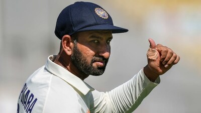 Cheteshwar Pujara reacts during Day 1 of Nagpur Test (PTI) Cheteshwar Pujara reacts during Day 1 of Nagpur Test (PTI)