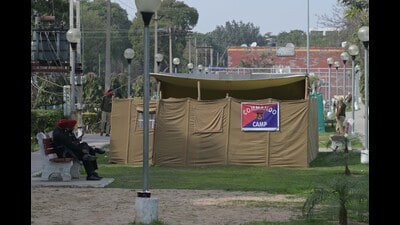 Punjab Police have made their camp office in a park located in the residential area opposite houses near Sector 52/53 Chowk. Senior police officers, including Mohali SSP, SPs and DSPs, can be seen holding meetings inside the temporary camp office. With CBSE Class 12 exams starting from Wednesday, students are bearing the brunt of protest at YPS Chowk. (Ravi Kumar/HT) Punjab Police have made their camp office in a park located in the residential area opposite houses near Sector 52/53 Chowk. Senior police officers, including Mohali SSP, SPs and DSPs, can be seen holding meetings inside the temporary camp office. With CBSE Class 12 exams starting from Wednesday, students are bearing the brunt of protest at YPS Chowk. (Ravi Kumar/HT)