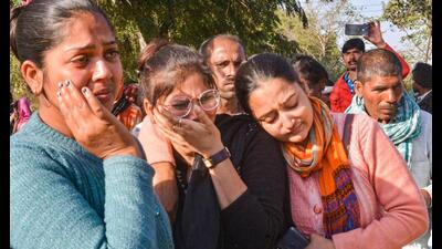 Relatives and family members of the mother-daughter duo who died during an anti-encroachment drive on Monday, mourn their loss, in Kanpur Dehat district, Tuesday. (PTI Photo) Relatives and family members of the mother-daughter duo who died during an anti-encroachment drive on Monday, mourn their loss, in Kanpur Dehat district, Tuesday. (PTI Photo)