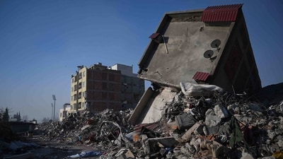 Collapsed buildings are pictured in Kahramanmaras on February 14, 2023, a week after an earthquake devastated parts of Turkey. (AFP)