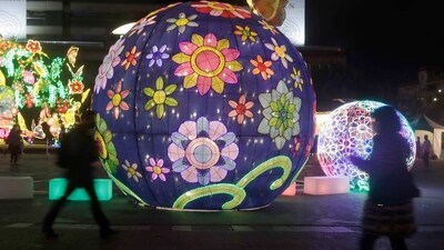 People walk past lanterns during the Lantern Festival, marking the end of the Chinese lunar New Year celebrations, in Taipei, Taiwan. (AP) People walk past lanterns during the Lantern Festival, marking the end of the Chinese lunar New Year celebrations, in Taipei, Taiwan. (AP)