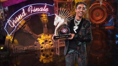 MC Stan poses with the Bigg Boss 16 winner's trophy.