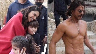 Deepika Padukone hugs Shah Rukh Khan's son AbRam on the sets of Besharam Rang. Deepika Padukone hugs Shah Rukh Khan's son AbRam on the sets of Besharam Rang.