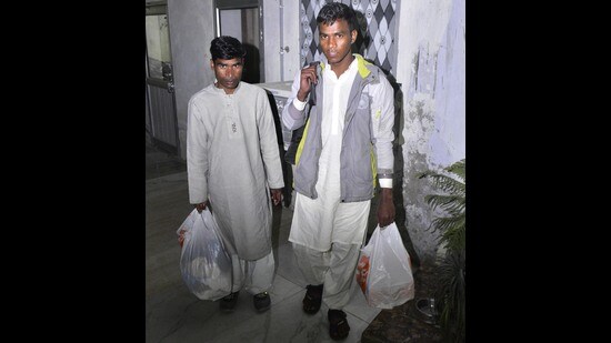 Indian nationals Gembara Ram Meghwal (Right) and Raju (Left) who were in jail in Pakistan and repatriated through Attari-Wagah Border on Tuesday. (Photo by Sameer Sehgal /Hindustan Times) (HT Photo)