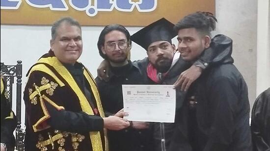 Phoolchand Kushwaha receiving his MCom degree during the SCD Government College’s convocation. (HT Photo)