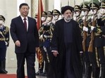 In this photo provided by China's Xinhua News Agency,In this photo released by Xinhua News Agency, Visiting Iranian President Ebrahim Raisi, right, and Chinese President Xi Jinping review an honor guard during a welcome ceremony at the Great Hall of the People in Beijing, Tuesday, Feb. 14, 2023. Chinese leader Xi Jinping expressed support for Iran during a visit by its president on Tuesday as Tehran tries to expand relations with Beijing and Moscow to offset Western sanctions over its nuclear development. (Pang Xinglei/Xinhua via AP)/Xinhua via AP) In this photo provided by China's Xinhua News Agency,In this photo released by Xinhua News Agency, Visiting Iranian President Ebrahim Raisi, right, and Chinese President Xi Jinping review an honor guard during a welcome ceremony at the Great Hall of the People in Beijing, Tuesday, Feb. 14, 2023. Chinese leader Xi Jinping expressed support for Iran during a visit by its president on Tuesday as Tehran tries to expand relations with Beijing and Moscow to offset Western sanctions over its nuclear development. (Pang Xinglei/Xinhua via AP)/Xinhua via AP)