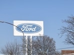 A sign for Ford Motor Co. at the automaker's plant in Cologne, Germany,  Ford will dismiss some 11% of its workforce in Europe in the latest sign of industrial disruption caused by the automotive sector's shift to electric vehicles. (Bloomberg)