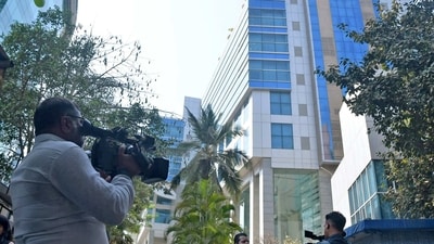 BBC India Offices: Media persons stand outside the BBC office where the survey is being conducted by Income Tax officials, in Mumbai. BBC India Offices: Media persons stand outside the BBC office where the survey is being conducted by Income Tax officials, in Mumbai.