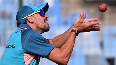 Mitchell Starc catches the ball during a practice session at the Arun Jaitley Stadium in New Delhi (AFP)