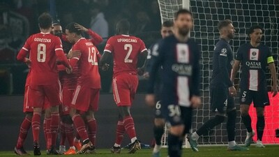 Bayern's Kingsley Coman celebrates with teammates after scoring his side's opening goal during the Champions League round of 16 first leg soccer match between Paris Saint Germain and Bayern Munich, at the Parc des Princes stadium, in Paris, France, Tuesday, Feb. 14, 2023. (AP Photo/Christophe Ena) (AP) Bayern's Kingsley Coman celebrates with teammates after scoring his side's opening goal during the Champions League round of 16 first leg soccer match between Paris Saint Germain and Bayern Munich, at the Parc des Princes stadium, in Paris, France, Tuesday, Feb. 14, 2023. (AP Photo/Christophe Ena) (AP)