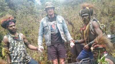 A man, identified as Philip Mehrtens, the New Zealand pilot who is said to be held hostage by a pro-independence group, stands among the separatist fighters in Indonesia's Papua region, in this undated picture released on February 14, 2023. (Reuters) A man, identified as Philip Mehrtens, the New Zealand pilot who is said to be held hostage by a pro-independence group, stands among the separatist fighters in Indonesia's Papua region, in this undated picture released on February 14, 2023. (Reuters)