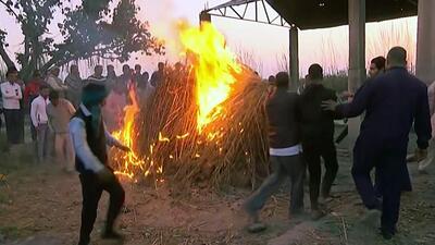Last rites of Nikki Yadav being performed by the family members at her native village on Wednesday. (ANI)
