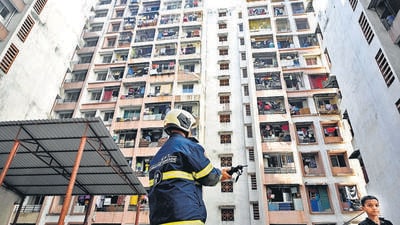 Mumbai, India - February 15, 2023: A 70-year-old woman died and nine hospitalised over suffocation after a fire broke out in a 13-storey residential building located in Premier Compound, Kohinoor City, at Kurla, in Mumbai, India, on Wednesday, February 15, 2023. (Photo by Vijay Bate/HT Photo) (HT PHOTO) Mumbai, India - February 15, 2023: A 70-year-old woman died and nine hospitalised over suffocation after a fire broke out in a 13-storey residential building located in Premier Compound, Kohinoor City, at Kurla, in Mumbai, India, on Wednesday, February 15, 2023. (Photo by Vijay Bate/HT Photo) (HT PHOTO)
