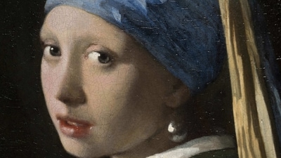 Detail of Girl with a Pearl Earring during a press preview of the Vermeer exhibit at Amsterdam's Rijksmuseum. (AP Photo/Peter Dejong) (AP) Detail of Girl with a Pearl Earring during a press preview of the Vermeer exhibit at Amsterdam's Rijksmuseum. (AP Photo/Peter Dejong) (AP)