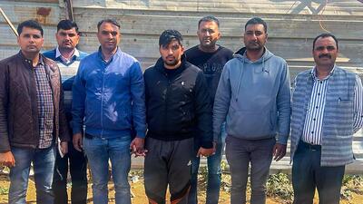 Sahil Gehlot (centre) after his arrest in New Delhi. Sahil Gehlot (centre) after his arrest in New Delhi.
