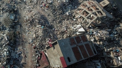 This aerial view shows collapsed buildings during ongoing rescue operations in Kahramanmaras, southeastern Turkey, on February 14, 2023, eight days after a 7,8-magnitude struck the country's southeast. - The death toll from a catastrophic earthquake that hit Turkey and Syria nears 40,000 on February 14, 2023, with search and rescue teams starting to wind down their work. (Photo by BULENT KILIC / AFP) (AFP) This aerial view shows collapsed buildings during ongoing rescue operations in Kahramanmaras, southeastern Turkey, on February 14, 2023, eight days after a 7,8-magnitude struck the country's southeast. - The death toll from a catastrophic earthquake that hit Turkey and Syria nears 40,000 on February 14, 2023, with search and rescue teams starting to wind down their work. (Photo by BULENT KILIC / AFP) (AFP)