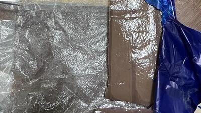 The contraband was ingeniously concealed in trolley bags and file folders to hoodwink the law enforcement agencies. (HT Photo) The contraband was ingeniously concealed in trolley bags and file folders to hoodwink the law enforcement agencies. (HT Photo)