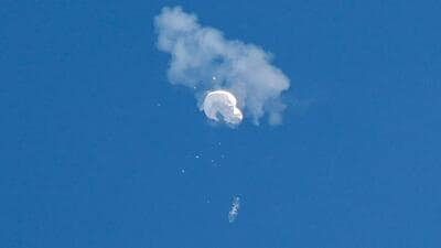 The suspected Chinese spy balloon drifts to the ocean after being shot down off the coast in Surfside Beach, South Carolina, US, on February 4. (REUTERS) The suspected Chinese spy balloon drifts to the ocean after being shot down off the coast in Surfside Beach, South Carolina, US, on February 4. (REUTERS)