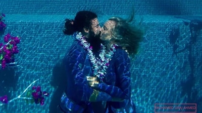 Beth Neale and Miles Cloutier locked their lips for over 4 minutes and 6 seconds underwater in the Maldives to break the record. (Guinness World Records) Beth Neale and Miles Cloutier locked their lips for over 4 minutes and 6 seconds underwater in the Maldives to break the record. (Guinness World Records)