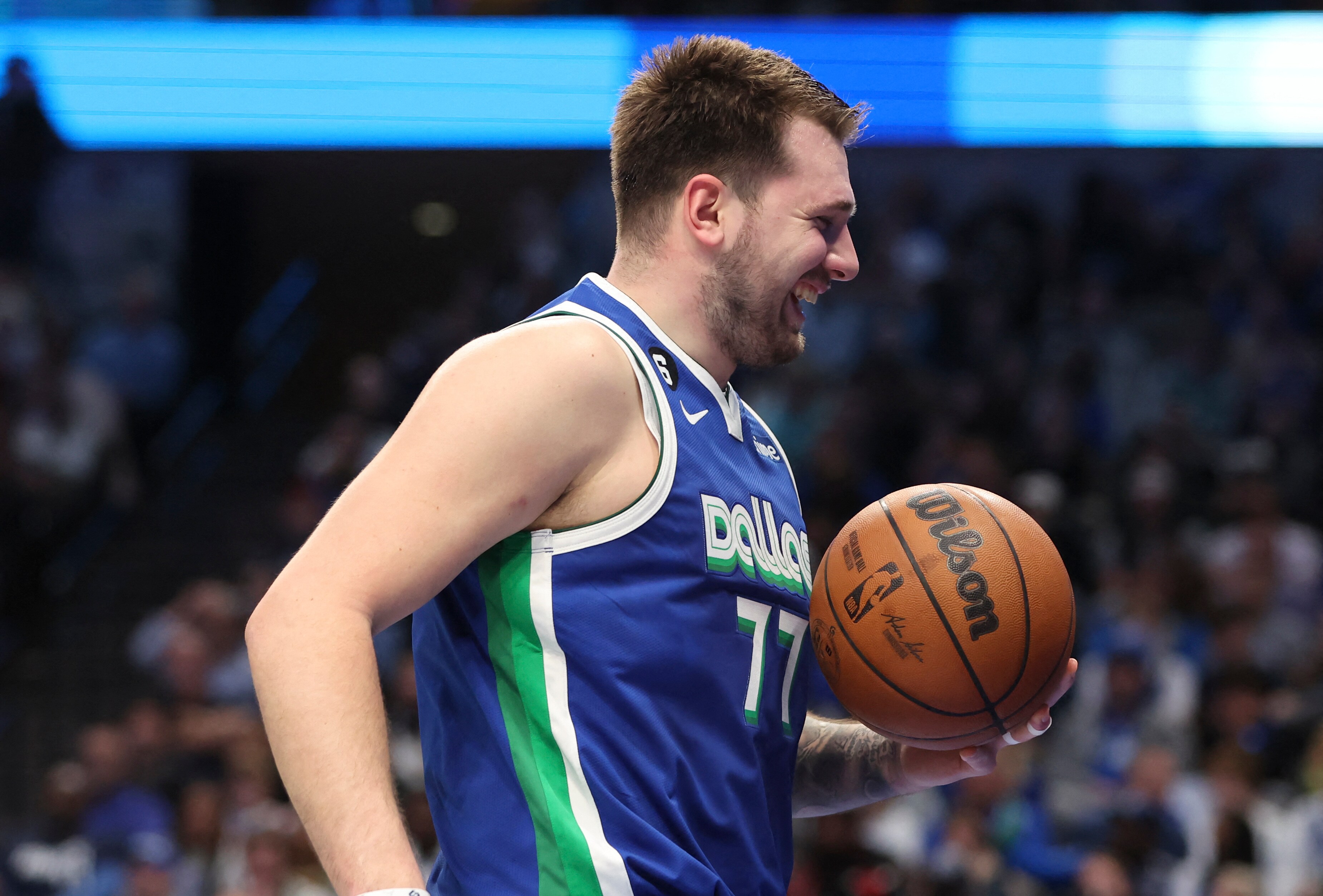Dallas Mavericks guard Luka Doncic (77) laughs during the game against the Minnesota Timberwolves at American Airlines Center. (USA TODAY Sports)