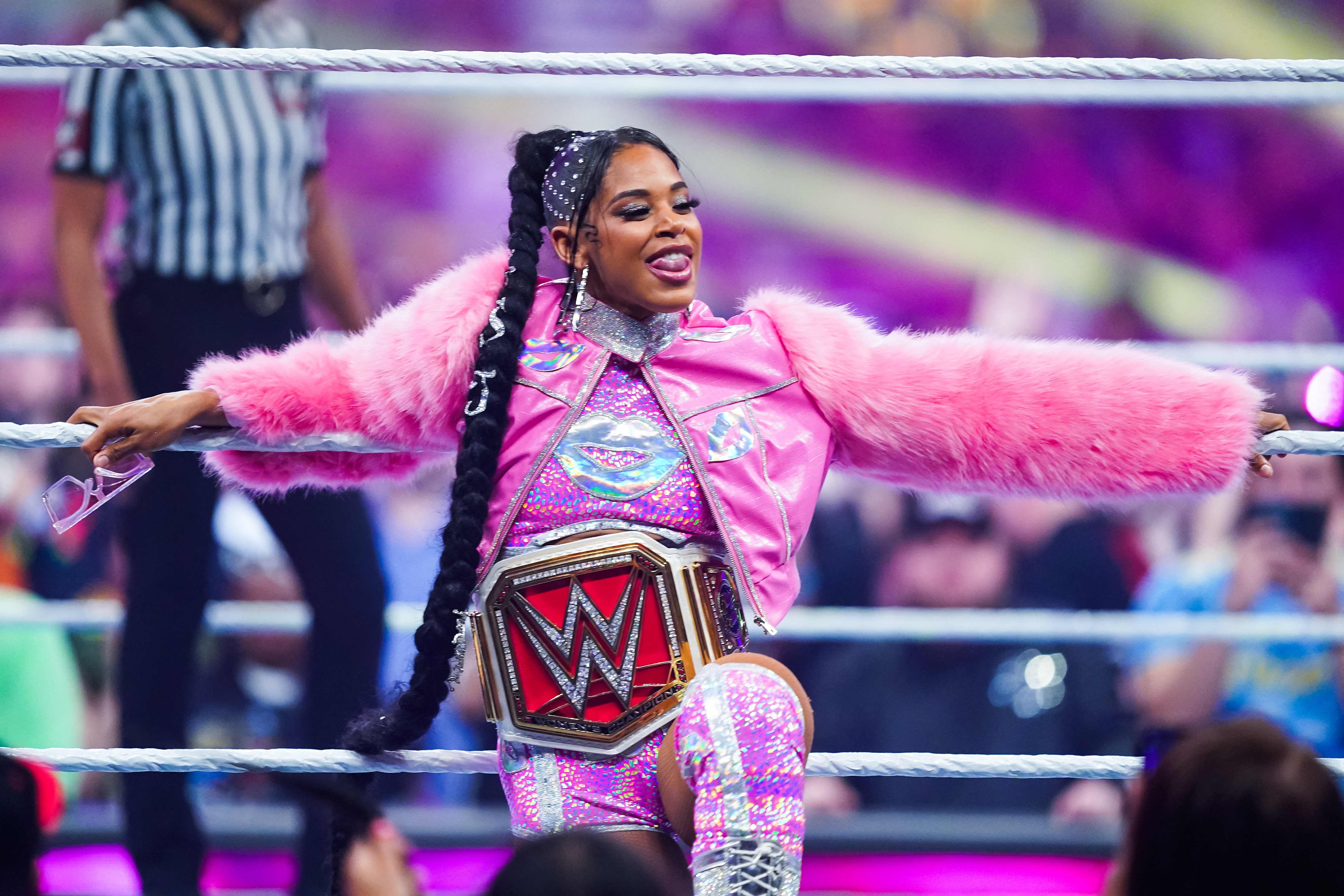 Bianca Belair is introduced prior to the Raw Women's championship during the WWE Royal Rumble event at the Alamodome. (Getty Images via AFP) Bianca Belair is introduced prior to the Raw Women's championship during the WWE Royal Rumble event at the Alamodome. (Getty Images via AFP)