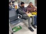 Madhur Singh eating home-cooked aalo ke parathe with his mom at the airport. Madhur Singh eating home-cooked aalo ke parathe with his mom at the airport.