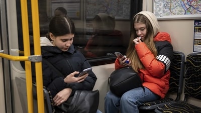 Ukrainian refugee circus student twins Anna and Mariia Lysytska travel together on a subway to their training facility in Budapest. Anna Lysytska, a 14-year-old acrobat, told AP that it had been difficult at first to adapt to life in Hungary after fleeing her home in Kharkiv but staying focused on her training had helped ease the transition. Lysytska’s twin sister, Mariia told AP what she liked most about Hungary at first was that “there were no explosions," (Denes Erdos / AP ) Ukrainian refugee circus student twins Anna and Mariia Lysytska travel together on a subway to their training facility in Budapest. Anna Lysytska, a 14-year-old acrobat, told AP that it had been difficult at first to adapt to life in Hungary after fleeing her home in Kharkiv but staying focused on her training had helped ease the transition. Lysytska’s twin sister, Mariia told AP what she liked most about Hungary at first was that “there were no explosions," (Denes Erdos / AP )