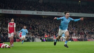 Manchester City's Jack Grealish celebrates after scoring his side's second goal during the English Premier League soccer match between Arsenal and Manchester City at the Emirates stadium in London, England, Wednesday, Feb.15, 2023. (AP Photo/Kin Cheung) (AP) Manchester City's Jack Grealish celebrates after scoring his side's second goal during the English Premier League soccer match between Arsenal and Manchester City at the Emirates stadium in London, England, Wednesday, Feb.15, 2023. (AP Photo/Kin Cheung) (AP)