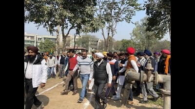 Kumbra village residents and Mohali MLA Kulwant Singh during the canal water inauguration ceremony at the village on Thursday. (HT Photo)