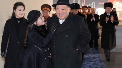North Korea Ban On Names: North Korean leader Kim Jong Un, his wife Ri Sol Ju and their daughter Kim Ju Ae attend a military parade. (Reuters)