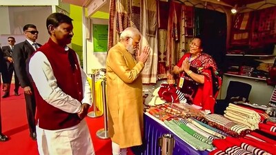 Prime Minister Narendra Modi with Union minister of tribal affairs Arjun Munda during the inauguration of 'Aadi Mahotsav' - National Tribal Festival, at Major Dhyan Chand National Stadium, in New Delhi. (PTI) Prime Minister Narendra Modi with Union minister of tribal affairs Arjun Munda during the inauguration of 'Aadi Mahotsav' - National Tribal Festival, at Major Dhyan Chand National Stadium, in New Delhi. (PTI)