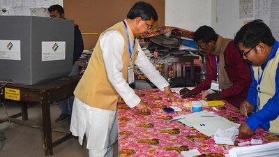 Tripura Chief Minister Manik Saha gets his finger marked with indelible ink before casting his vote at a polling booth during the Tripura Assembly elections, in Agartala. (PTI) Tripura Chief Minister Manik Saha gets his finger marked with indelible ink before casting his vote at a polling booth during the Tripura Assembly elections, in Agartala. (PTI)