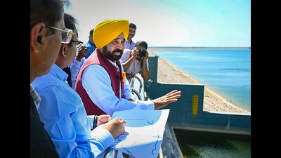 Punjab Chief Minister Bhagwant Mann visits a dam project in Telangana along with officials of Irrigation Department. (PTI photo)