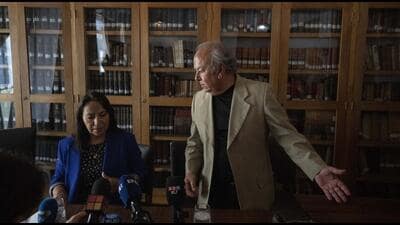 Rodolfo Reyes, right, a nephew of the late Chilean poet Pablo Neruda and lawyer Elisabeth Flores, prepare for a press conference, in Santiago, Chile, on Thursday. (AP) Rodolfo Reyes, right, a nephew of the late Chilean poet Pablo Neruda and lawyer Elisabeth Flores, prepare for a press conference, in Santiago, Chile, on Thursday. (AP)