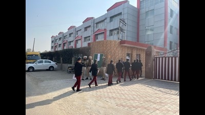 The examinations of Classes 10 and 12 of the CBSE on Thursday were held amid police deployment outside Lawrance Public Senior Secondary School, Sector 51, Mohali, which is located near the ongoing protest site of the Qaumi Insaaf Morcha. (HT Photo)