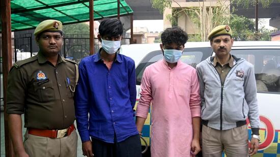 The two arrested accused in Noida on Thursday. (Sunil Ghosh/HT PHOTO)