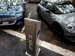 Electric cars are seen plugged in at a charging point. (Reuters/file) Electric cars are seen plugged in at a charging point. (Reuters/file)