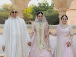 Kiara Advani with her parents at her wedding. Kiara Advani with her parents at her wedding.