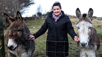 One of 120 extras in the film, Madeline Condell, poses with her donkeys on Achill island, on January 31. Condell owns two donkeys that missed out on appearing alongside the miniature donkey Jenny. Suggesting that the island was in the grip of an Oscars buzz, she told AFP, “We almost feel like we deserve an Oscar as well, because of the beauty of the area.” (Paul Faith / AFP) One of 120 extras in the film, Madeline Condell, poses with her donkeys on Achill island, on January 31. Condell owns two donkeys that missed out on appearing alongside the miniature donkey Jenny. Suggesting that the island was in the grip of an Oscars buzz, she told AFP, “We almost feel like we deserve an Oscar as well, because of the beauty of the area.” (Paul Faith / AFP)