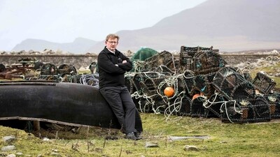Owner and manager of Achill Coaches, Alan Gielty, poses for a photograph on the Purteen harbour, on January 31. "For the last month an awful lot of people are travelling to the island just to see the sights of the movie," he told AFP. "It's already bringing in a lot of interest from outside and it's going to be very, very busy." (Paul Faith / AFP) Owner and manager of Achill Coaches, Alan Gielty, poses for a photograph on the Purteen harbour, on January 31. "For the last month an awful lot of people are travelling to the island just to see the sights of the movie," he told AFP. "It's already bringing in a lot of interest from outside and it's going to be very, very busy." (Paul Faith / AFP)