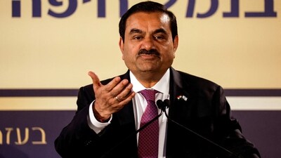PM Modi can't take the name of Adani and does not even allow anyone else to take the name in Parliament, Congress leader Pawan Khera said. (REUTERS)