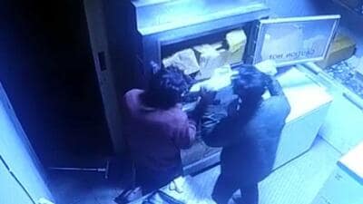 Burglars captured in the CCTVs while stealing cash and eatables from fast-food joint in Ludhiana. (HT Photo)
