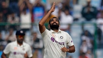 India's Mohammed Shami celebrates taking the wicket of Australia's Travis Head (REUTERS)